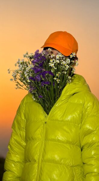 Floral Head In Citrus Jacket Floral head in citrus jacket — ai-generated fashion concept