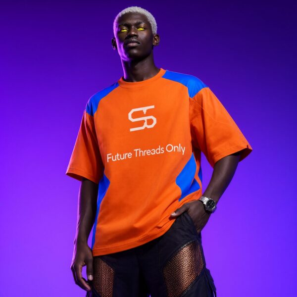 Cyberpunk Orange T-Shirt Look A model wears an orange and blue cyberpunk t-shirt with 'future threads only' text, standing against a purple background.