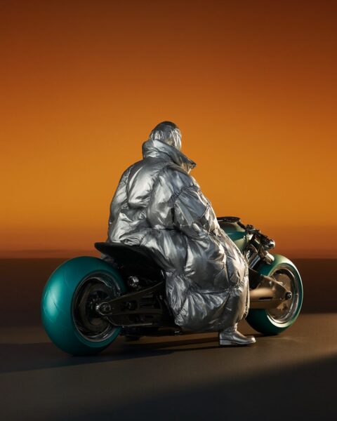 Copper-Padded Future Rider A person wearing a reflective silver padded jacket sits on a futuristic teal motorcycle under an orange sky.