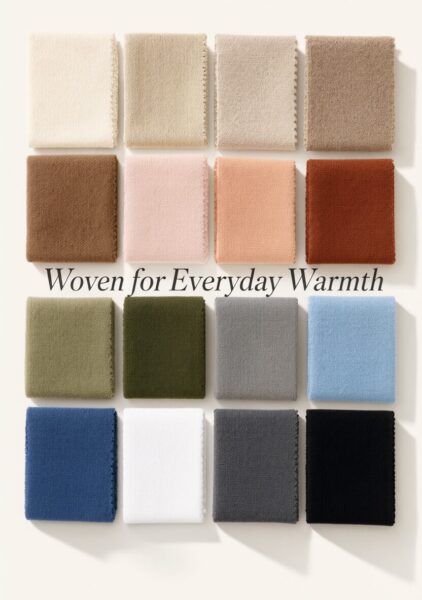 Textured Fabric Swatches In Earth Tones Grid of textured fabric swatches in earthy tones including beige, brown, pink, green, blue, gray, and black against a light background.